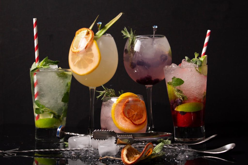 EnYe Bar A diverse collection of colorful cocktails with garnishes, perfect for a refreshing drink experience.